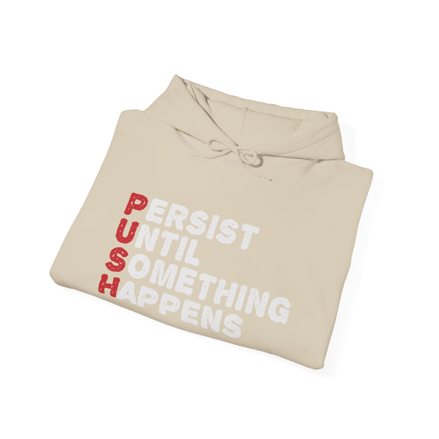A folded biege unisex hooded sweatshirt with the text 'PUSH Persist Until Something Happens' printed on the front.