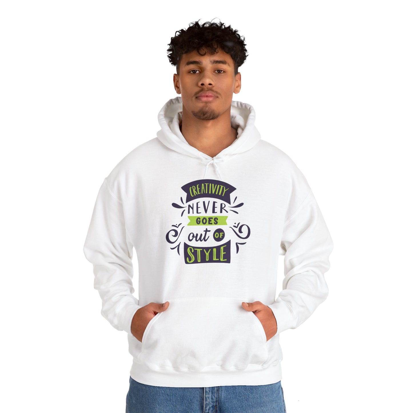 A male model wearing a white unisex hooded sweatshirt with 'Creativity Never Goes Out Of Style' text design in green and purple.