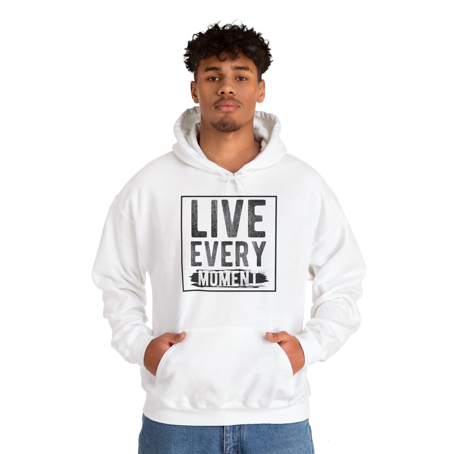 A male model wearing a white unisex hooded sweatshirt with the text 'Live Every Moment' printed on the front.