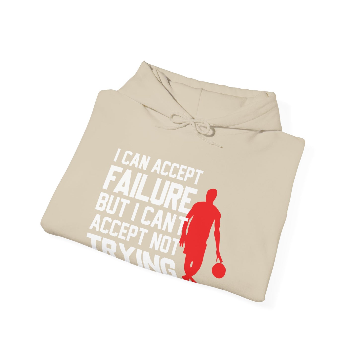 A folded biege unisex hooded sweatshirt with text design on the front.