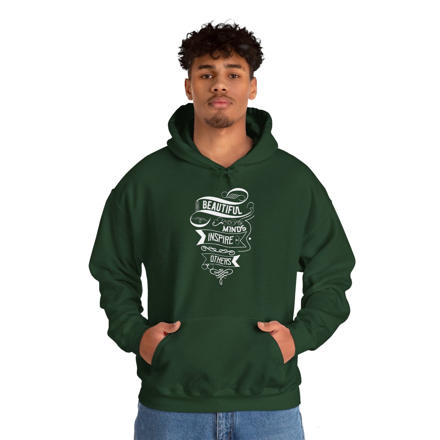 A person wearing a green unisex hooded sweatshirt with 'Beautiful Minds Inspire Others' text design on the front.