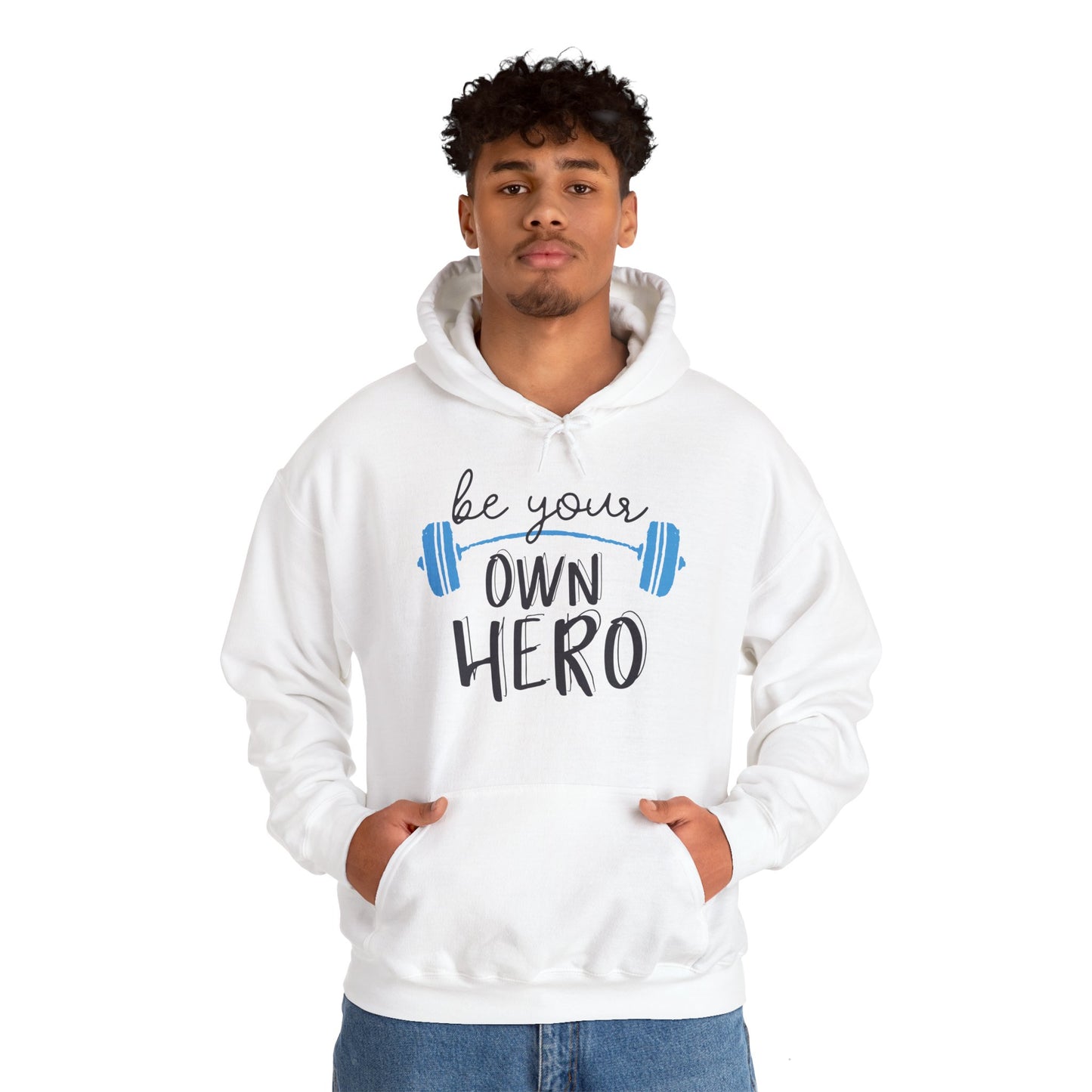 A male model wearing a white unisex hooded sweatshirt with 'BE YOUR OWN HERO' text and a blue graphic of a weight on the front.