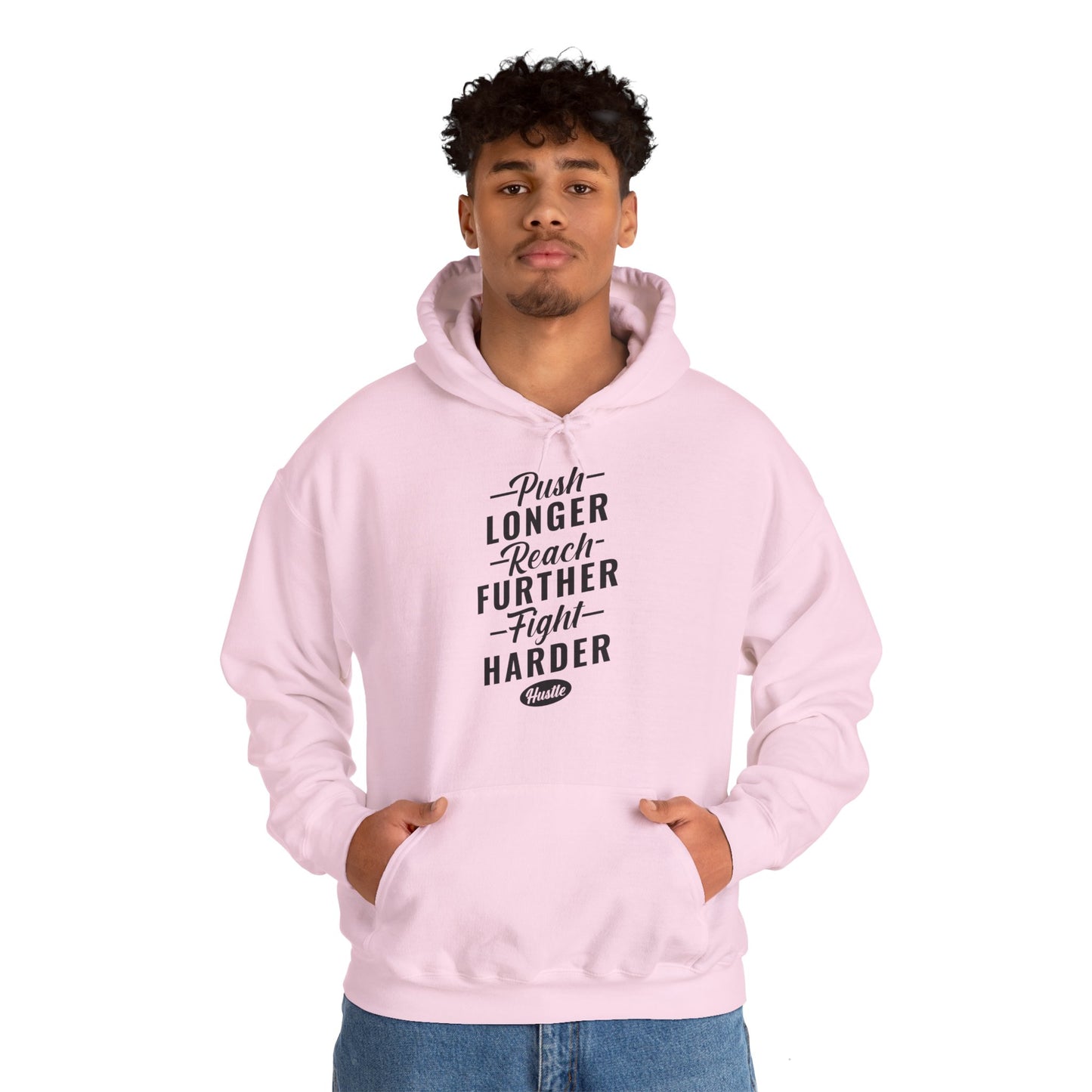 Person wearing a pink unisex hooded sweatshirt with 'Push Longer Reach Further Fight Harder' printed on the front.