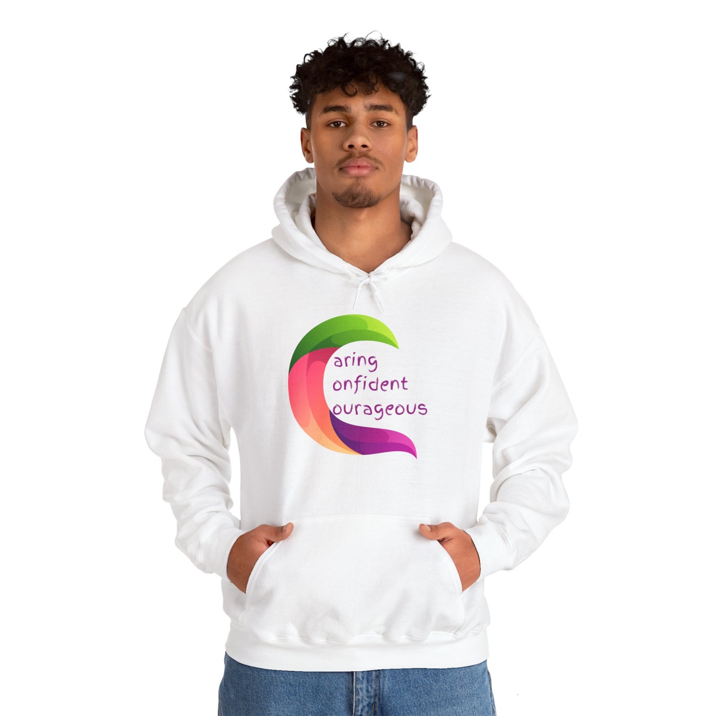 A male model wearing a white unisex hooded sweatshirt with a colorful graphic on the front that reads 'Caring Confident Courageous'.
