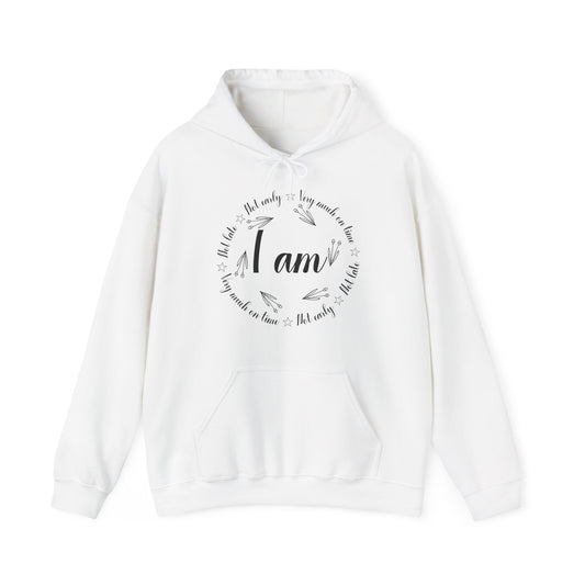 A white unisex hooded sweatshirt with text design on the front and an adjustable drawstring hood.