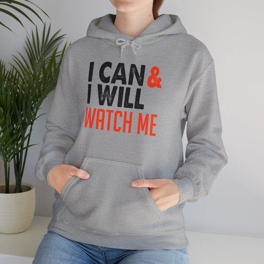Person wearing a sport grey unisex hooded sweatshirt with 'I CAN & I WILL WATCH ME' printed in black text on the front.