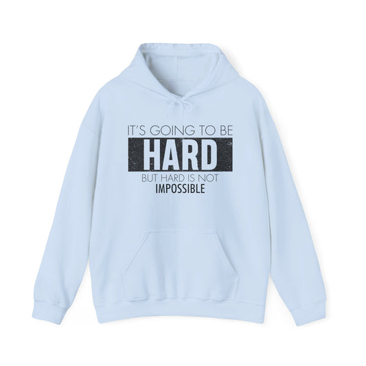 A blue unisex hooded sweatshirt with the text 'It's Going To Be Hard BUT NOT IMPOSSIBLE' printed on the front.