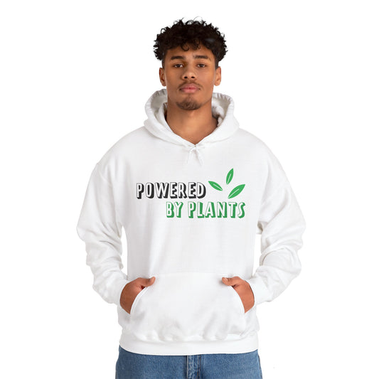 A male model wearing a white hooded sweatshirt with the text 'Powered By Plants' printed on the front.